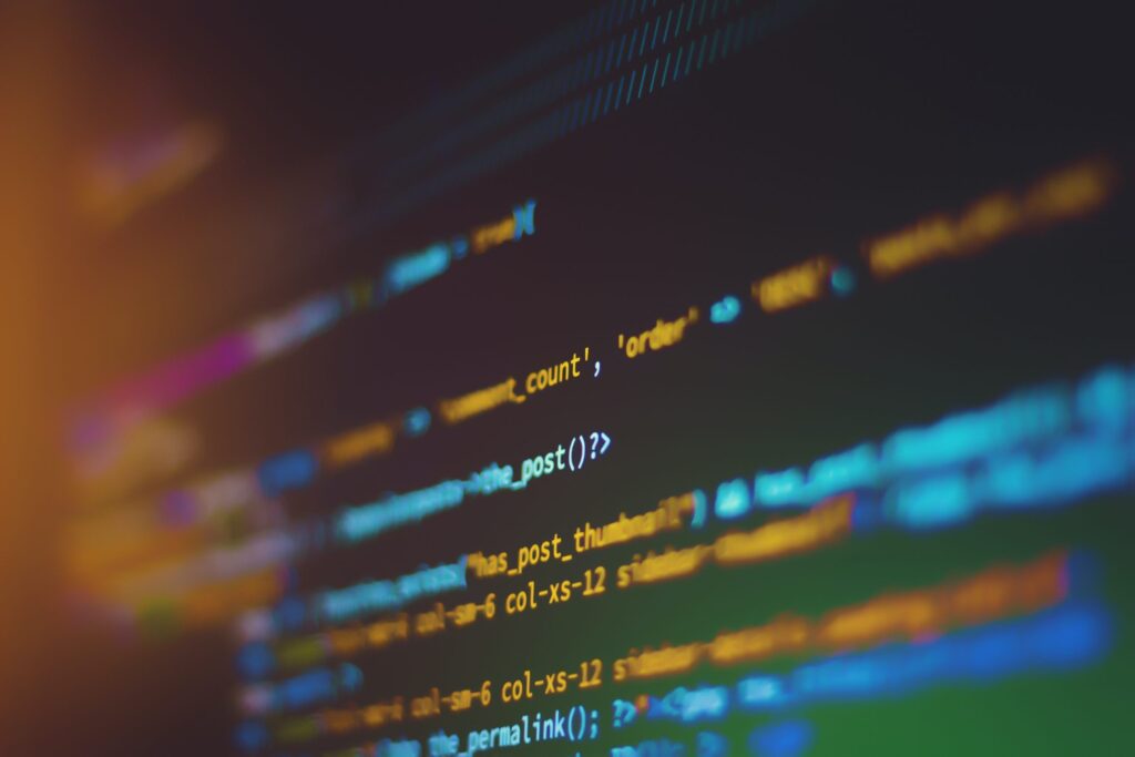 A close-up view of a computer screen displaying lines of code in a programming environment.
